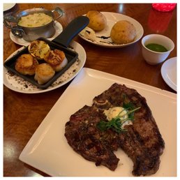 Porterhouse Steak, Scallops, spring risotto, and chimichurri. Porterhouse Steak, Scallops, spring risotto, and chimichurri.