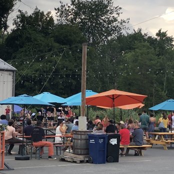 Reverie Brewing Company - a large group of people sitting at picnic tables - Breweries Near Me - Newtown, Connecticut