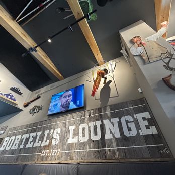 Bortells Lounge - a man in a baseball uniform - Sports Bars Near Me - Anna Maria, Florida