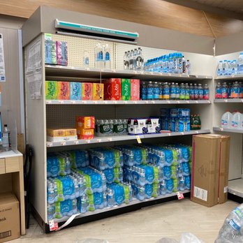 Walgreens - shelves of bottled water in a store - Drugstores Near Me - Bronx, New York Walgreens - shelves of bottled water in a store - Drugstores Near Me - Bronx, New York