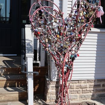 Village Baking Co - Lock heart statue outside of bakery. - Bakeries Near Me - Dallas, Texas Village Baking Co - Lock heart statue outside of bakery. - Bakeries Near Me - Dallas, Texas