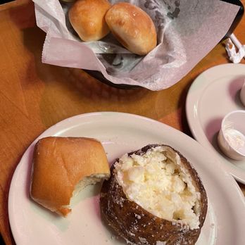 Texas Roadhouse - Side baked potato and the iconic rolls - Barbeque Near Me - Buford, Georgia Texas Roadhouse - Side baked potato and the iconic rolls - Barbeque Near Me - Buford, Georgia