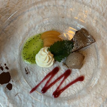 Restaurant Bären - Excellent dessert - mousse, kiwi sauce, cake, and fresh apricots - Swiss Food Near Me - Wengen, BE