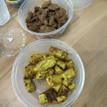 The Hummus Republic - This is the lemon chicken and the Moroccan beef. - Mediterranean Near Me - Jacksonville, North Carolina