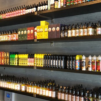 Johnny Vapors - shelves of various flavored liquids - Vape Shops Near Me - St. Petersburg, Florida Johnny Vapors - shelves of various flavored liquids - Vape Shops Near Me - St. Petersburg, Florida