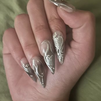 Nails by Ken - Asked for nude to black ombré with silver chrome cybersigilism detailing and gems. Couldn't be happier with the result! - Nail Salons Near Me - El Cerrito, California Nails by Ken - Asked for nude to black ombré with silver chrome cybersigilism detailing and gems. Couldn't be happier with the result! - Nail Salons Near Me - El Cerrito, California