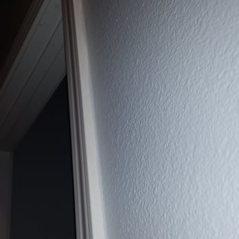 Wall Works - Paint on door jambs. Were not taped off apparently - Painters Near Me - Murrieta, California