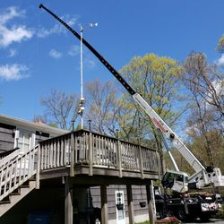 Jim's Tree Service - From backyard to roadway, amazing reach.