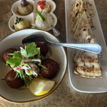 Trata On The River - Crab Cakes and Pita and Dip Sampler - Salad Near Me - Piermont, New York Trata On The River - Crab Cakes and Pita and Dip Sampler - Salad Near Me - Piermont, New York