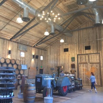 Peltzer Winery - Inside the wine tasting space! The entire thing is done in reclaimed wood (awesome if you are a Fixer Upper uber fan like me)! - Wineries Near Me - Temecula, California