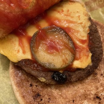 McDonald's - a hamburger with cheese and pickles on it - Burgers Near Me - Lexington, North Carolina McDonald's - a hamburger with cheese and pickles on it - Burgers Near Me - Lexington, North Carolina