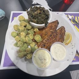 Blackened catfish, collard greens and fired okra. Blackened catfish, collard greens and fired okra.