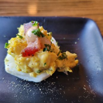 Tavern - Deviled egg. 6 come with every order-little celery for crunch, plenty of chives, not too mustardy-topped with bacon and a dab of spicy mayo - New American Near Me - Fort Worth, Texas Tavern - Deviled egg. 6 come with every order-little celery for crunch, plenty of chives, not too mustardy-topped with bacon and a dab of spicy mayo - New American Near Me - Fort Worth, Texas