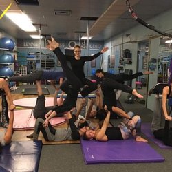 Elevated Fitness Studio - Acro Yoga class