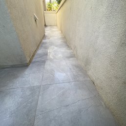 Used to be dirt and trees. Created a nice walkway.