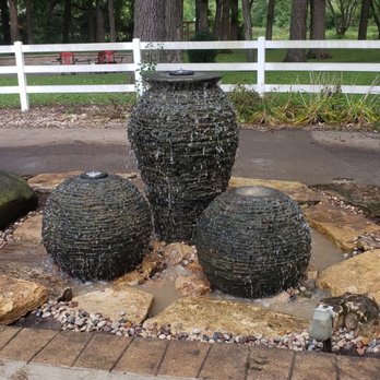 M&A Greenscape - three vases in a garden - Landscaping Near Me - Hebron, Illinois