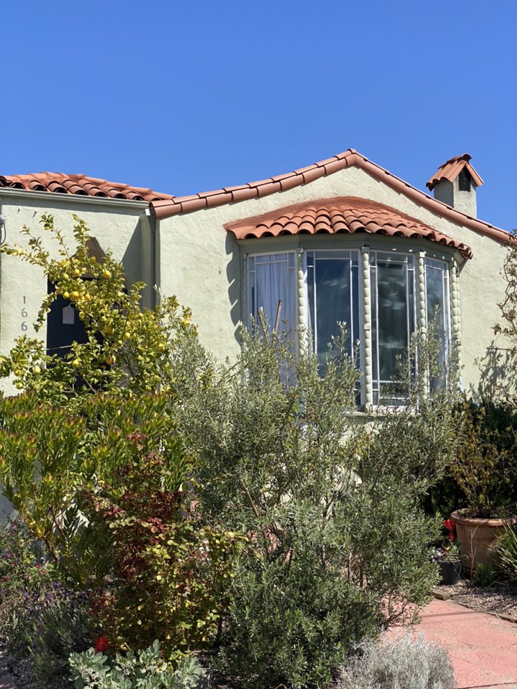 Slide of Tradition Roofing