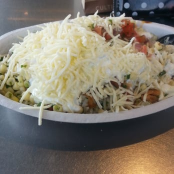Chipotle Mexican Grill - Chicken bowl with white rice, mild and corn salsa, sour cream and cheese - Mexican Near Me - Ocala, Florida Chipotle Mexican Grill - Chicken bowl with white rice, mild and corn salsa, sour cream and cheese - Mexican Near Me - Ocala, Florida