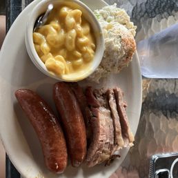Marble 2nd Cut Brisket, and sausage Platter with Mac and cheese and potato salad Marble 2nd Cut Brisket, and sausage Platter with Mac and cheese and potato salad