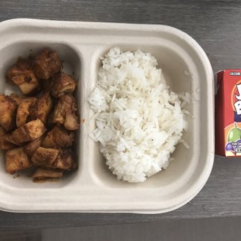 Bolay - Kids bbq chicken  and rice oh and the all important juice box. Standard easy kids meal, and yes it tastes good as well. - New American Near Me - Orlando, Florida
