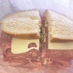 Stacked Reuben sandwich. Piled high with corned beef from Grobbel premium meats.