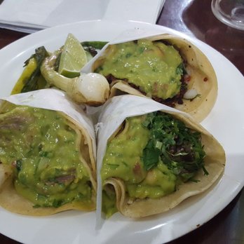 Tacos El Bronco - Carnitas, lengua, and chorizo. All of which I wind up dropping all over the plate because I'm a savage, and can't master that cone shape. - Mexican Near Me - Brooklyn, New York Tacos El Bronco - Carnitas, lengua, and chorizo. All of which I wind up dropping all over the plate because I'm a savage, and can't master that cone shape. - Mexican Near Me - Brooklyn, New York