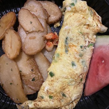 Eggspectation - Richmond - Lobster omelette with potatoes and fruit. - Breakfast & Brunch Near Me - Richmond, Virginia