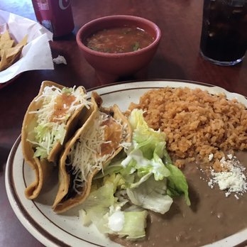 Mi Tierra Restaurant - Lunch special plate; 2 crunchy shredded beef tacos, fabulous refried beans, rice & salad for $7.25 + tx & tip. - Mexican Near Me - Salinas, California