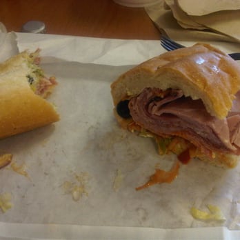 Nardelli's Grinder Shoppe - Half italian grinder. Notice the hot sauce dripping out. - Delis Near Me - Danbury, Connecticut Nardelli's Grinder Shoppe - Half italian grinder. Notice the hot sauce dripping out. - Delis Near Me - Danbury, Connecticut