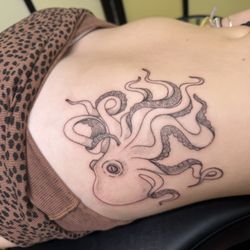 Sacred Traditions Tattoo - Thin line tattoo taken at the shop