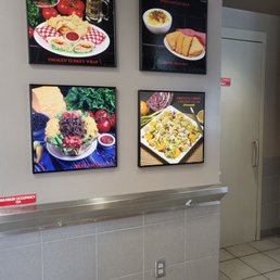 a wall with pictures of food a wall with pictures of food