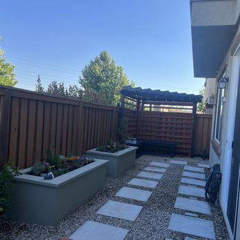 Regalado Landscape - Paver walkway, custom planters with irrigation, custom pergola & benches, accent lights. - Landscaping Near Me