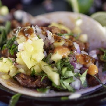 Spanglish Kitchen - My carnie asada taco has a little pineapple garnish! - Mexican Near Me - Alhambra, California Spanglish Kitchen - My carnie asada taco has a little pineapple garnish! - Mexican Near Me - Alhambra, California