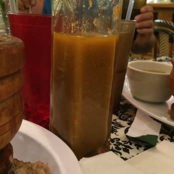 Isla Del Coqui Restaurant - Great spot!!!! Just like Abuela's cooking. That hot sauce in the picture... Yum!!! - Latin American Near Me - Greenacres, Florida