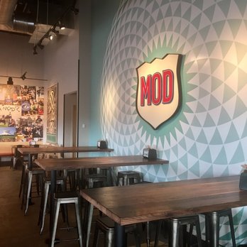 MOD Pizza - Casual, fun vibe- with plenty of high tops, booths, and short tables for groups. - Fast Food Near Me - Ladue, Missouri