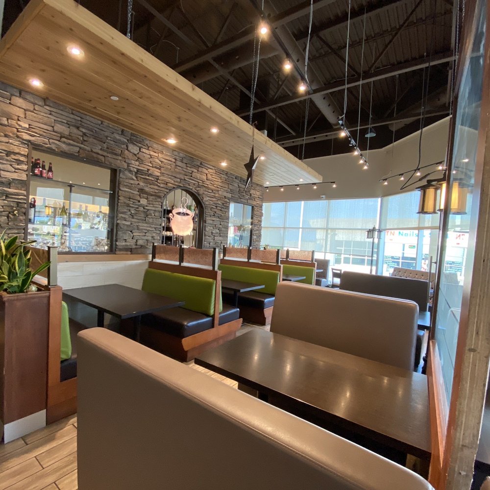 Simmering Kettle - a restaurant with a stone wall - Canadian (New) Near Me - Barrie, Ontario Simmering Kettle - a restaurant with a stone wall - Canadian (New) Near Me - Barrie, Ontario