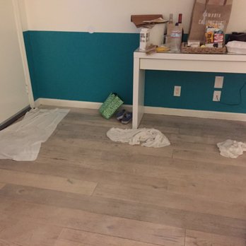 Cambria Beach Lodge - Soaked floor.  And "mini bar" consumes all table space - Hotels Near Me - Cambria, California