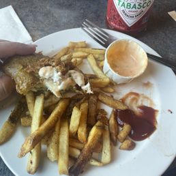 Halibut fish and chips with tarter sauce mixed with Tabasco Sriracha sauce