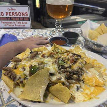 Cazadorez Mexican Restaurant - Steak fajita nachos I think. Huge portion. :) - Mexican Near Me - Shawnee, Oklahoma Cazadorez Mexican Restaurant - Steak fajita nachos I think. Huge portion. :) - Mexican Near Me - Shawnee, Oklahoma