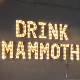 a sign that says drink mammoth a sign that says drink mammoth