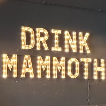 Mammoth Distilling - a sign that says drink mammoth - Distilleries Near Me - Bellaire, Michigan Mammoth Distilling - a sign that says drink mammoth - Distilleries Near Me - Bellaire, Michigan