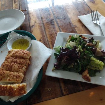 Trattoria La Caverna - Bread and salad with raspberry vinaigrette - Lounges Near Me - Hendersonville, Tennessee Trattoria La Caverna - Bread and salad with raspberry vinaigrette - Lounges Near Me - Hendersonville, Tennessee