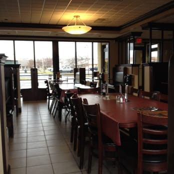 Pizza King - a dining room with tables and chairs - Pizza Near Me - Muncie, Indiana Pizza King - a dining room with tables and chairs - Pizza Near Me - Muncie, Indiana