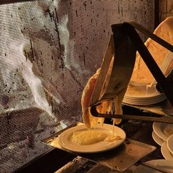 Fireside Dining - The raclette cheese melting from the heat of the fire