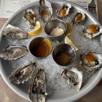 Reds' Bistro - Dozen Oysters with horseradish, mignonette sauce, and 3rd base sauce (amazing pineapple and habanero sauce) - New American Near Me - Loomis, California Reds' Bistro - Dozen Oysters with horseradish, mignonette sauce, and 3rd base sauce (amazing pineapple and habanero sauce) - New American Near Me - Loomis, California