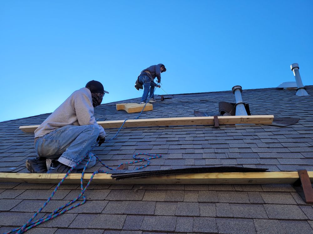 Slide of Del's & Son Roofing