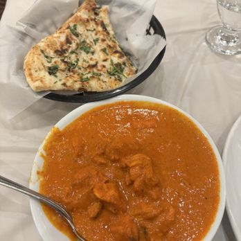 Aga's Restaurant & Catering - Chicken Tikka Masala with garlic naan - Pakistani Near Me - Houston, Texas Aga's Restaurant & Catering - Chicken Tikka Masala with garlic naan - Pakistani Near Me - Houston, Texas
