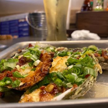 Shuckin' Shack Oyster Bar - Chargrilled Oysters  Parmesan Garlic - Seafood Near Me - Ocala, Florida