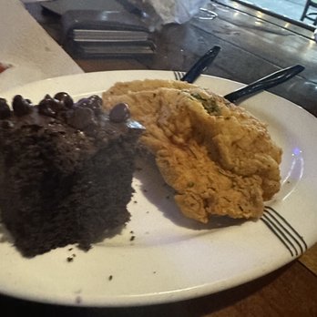 KnuckleHeads - Fried pork chop with double chocolate cake. Hats off to the chef on this one! - American Near Me - Ocean Springs, Mississippi