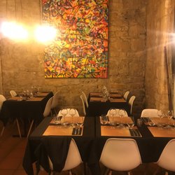 La Pizzéria Romane - Good amount of tables, super cool artwork throughout